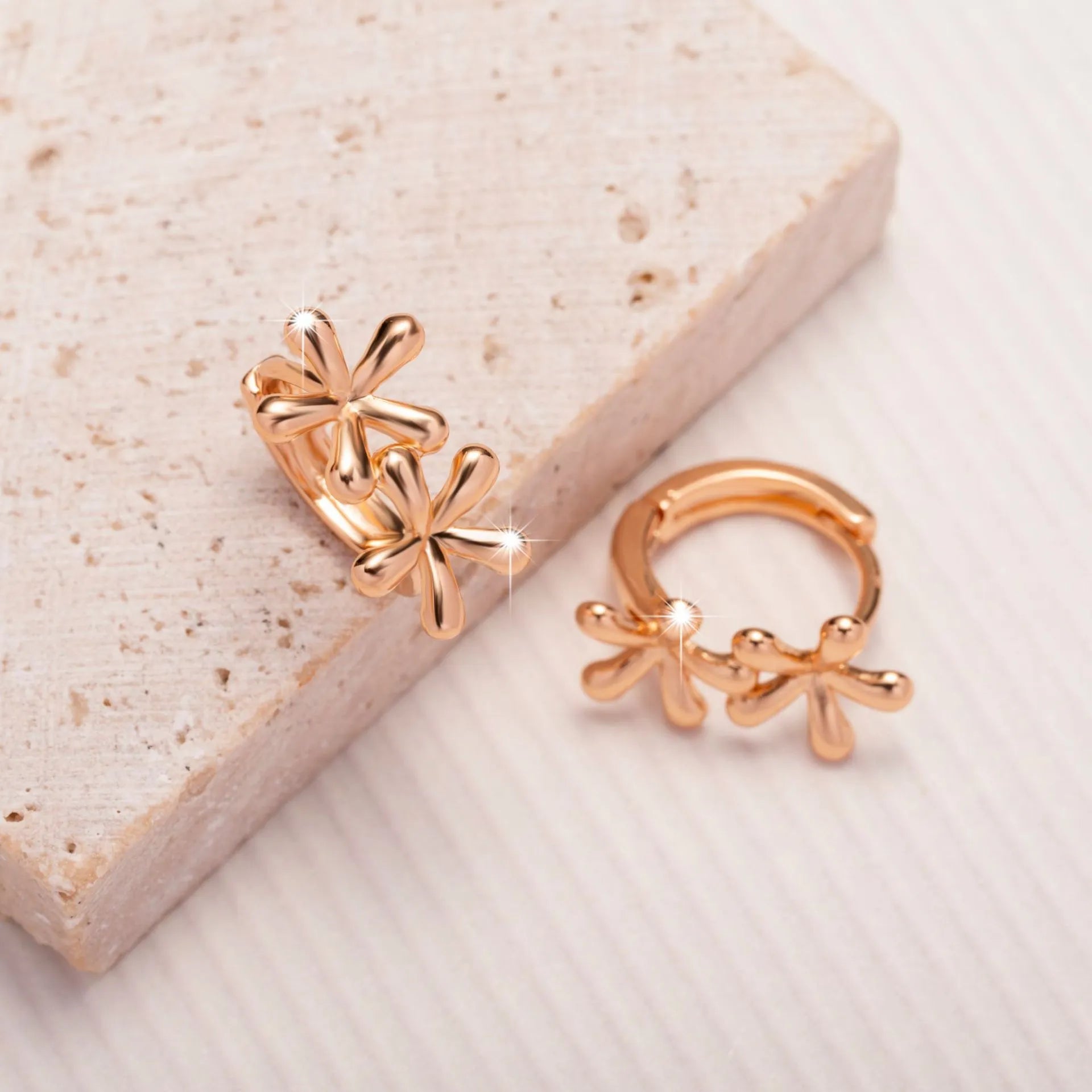 Rose gold electroplated waterdrop flower earrings with circular design in European and American style