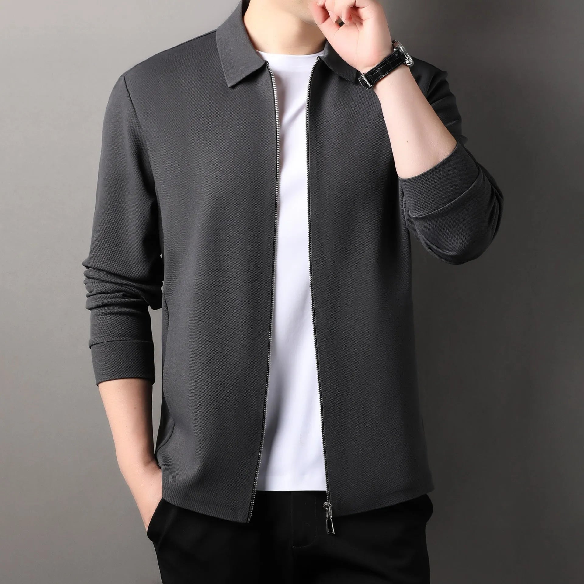 Men's apricot coloured business casual polyester jacket with straight hem on a hanger.
