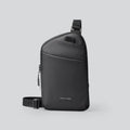 Men's black Oxford cloth crossbody bag with simple design showing sewing thread detailing and wear-resistant construction