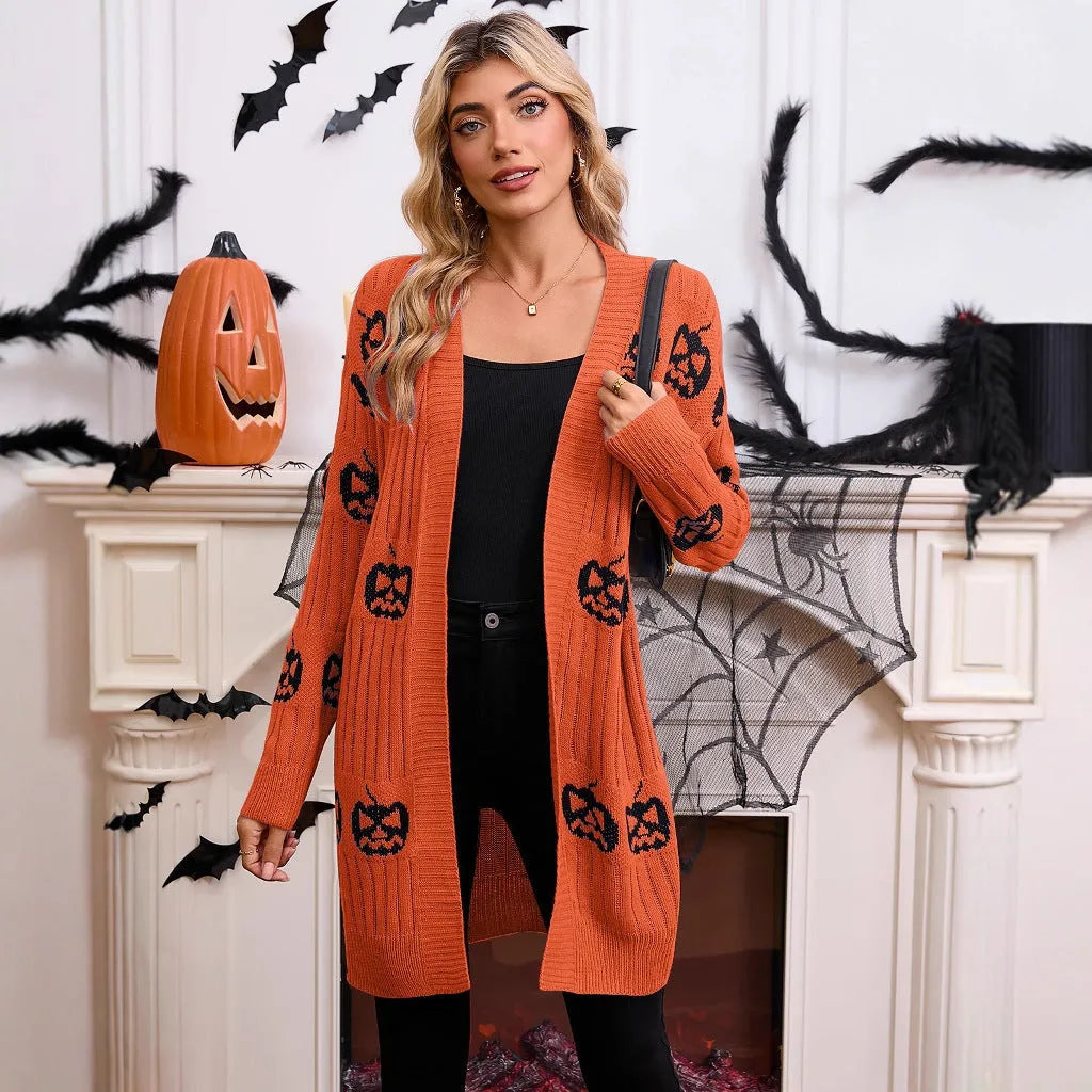 Women's black Halloween cardigan with orange pumpkin head jacquard pattern, straight cut with regular sleeves.