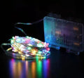 Copper wire string lights with battery box showing flexible wire with LED bulbs in various colour options