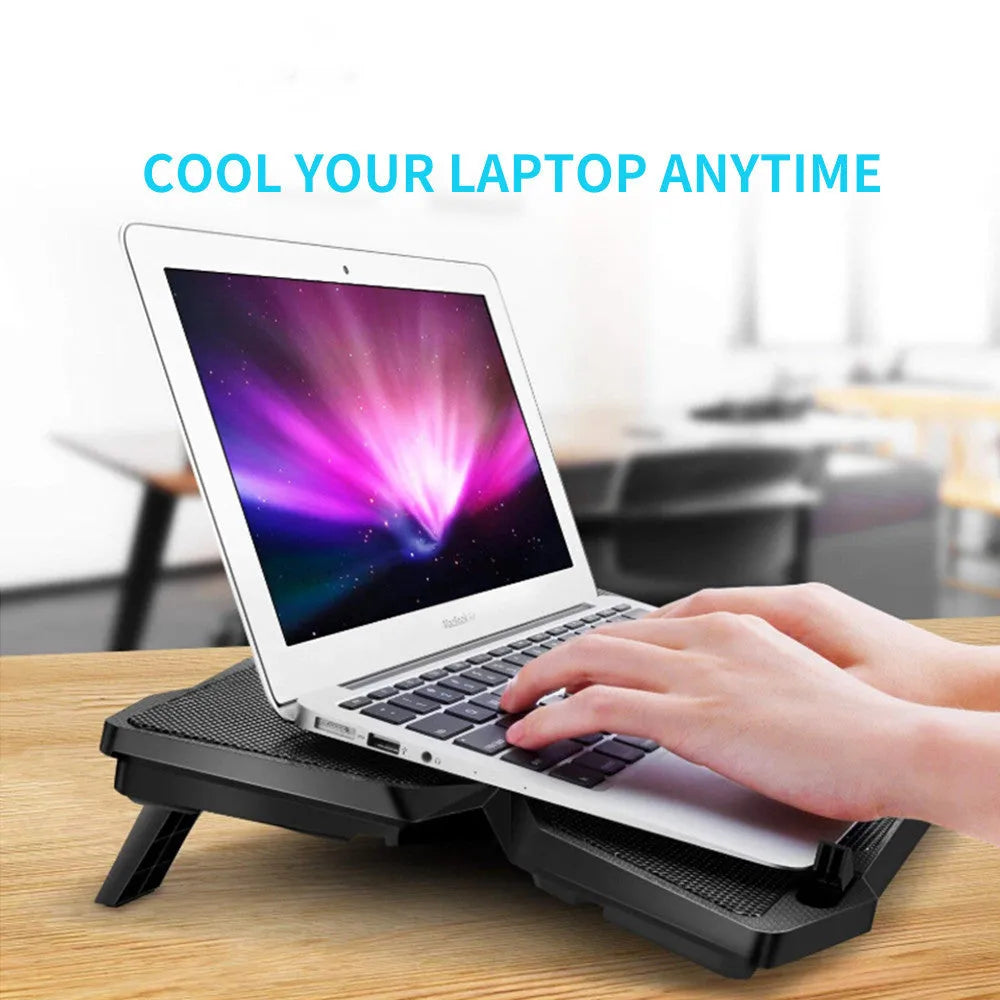 Blue computer cooling base with four LED fans, two USB ports, and speed control switches