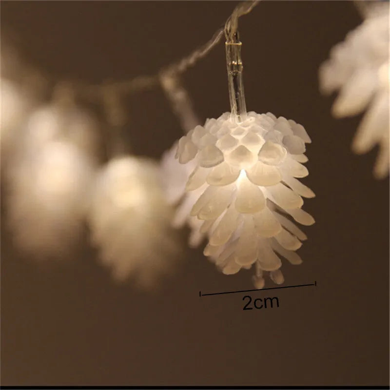 Warm white LED pine cone decorative light string powered by AA batteries