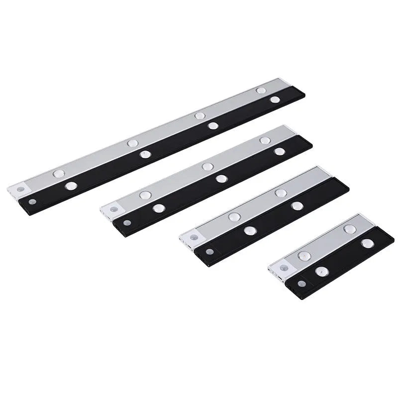 Rechargeable hill corrugated LED light strip in black or silver with magnetic mount on a wall.