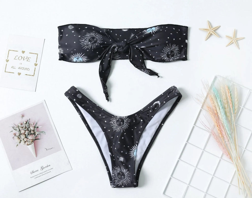 Black printed one-piece swimsuit with backless design and split tube top.