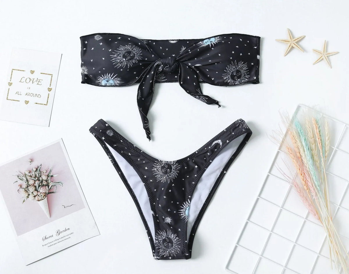 Black printed one-piece swimsuit with backless design and split tube top.