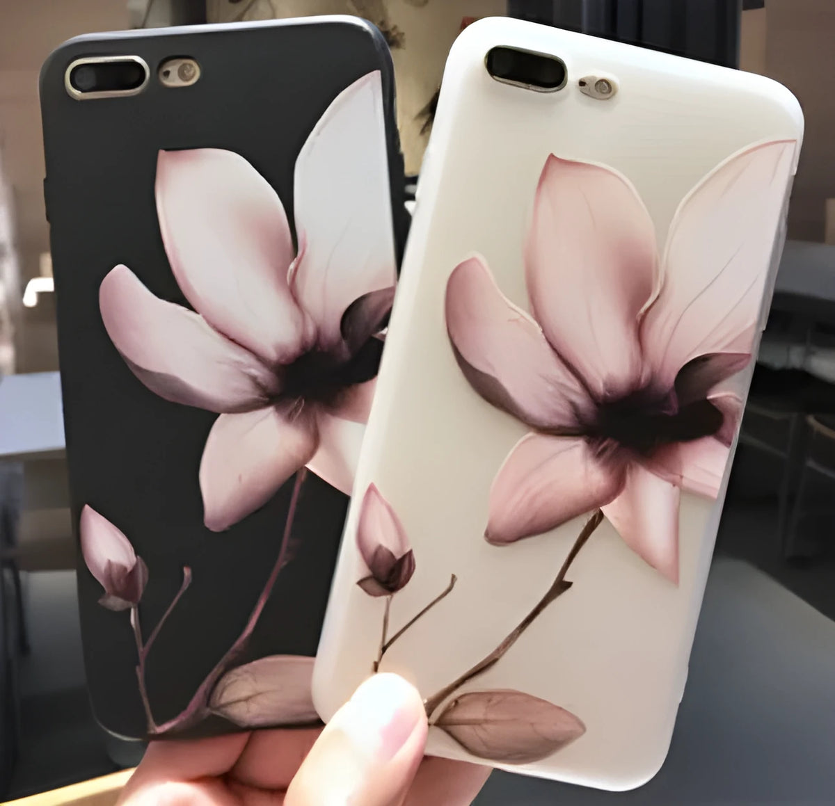 Embossed floral iPhone case in TPU material showing black and white colour options
