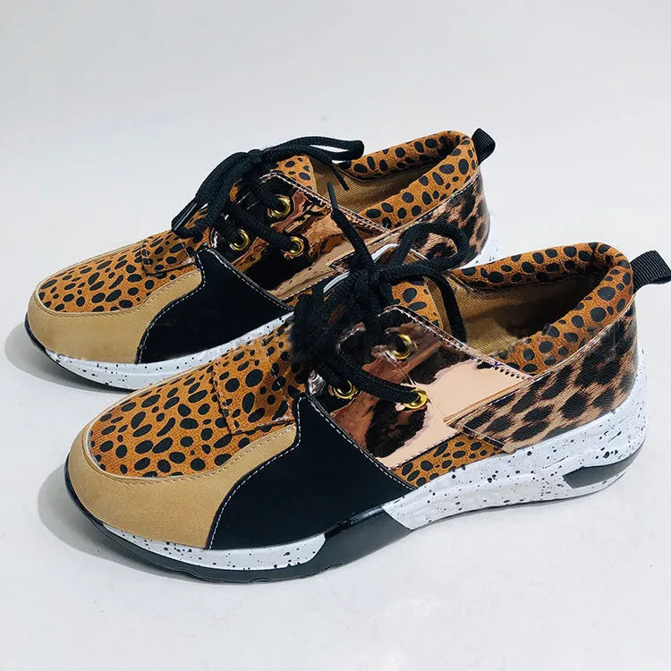 Women's casual suede flat sneakers with wedge heel in black, leopard, pink, panther, and snake pattern options.