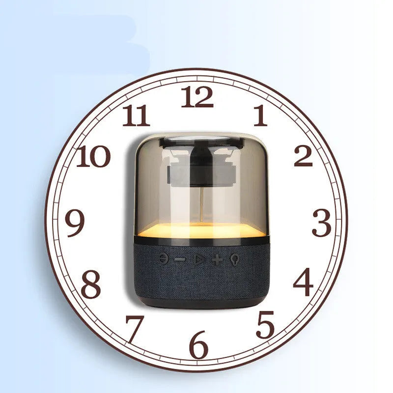 Black Four-Colour Light Touch Wireless Bluetooth Speaker with illuminated controls on a dark surface.