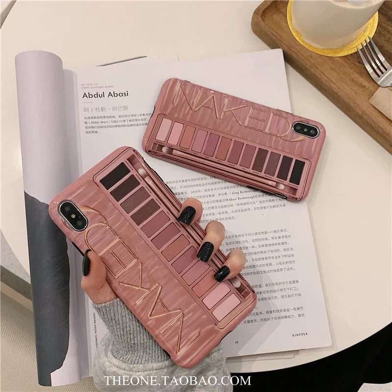 A flesh-coloured silicone case next to a grey one for various iPhone models.