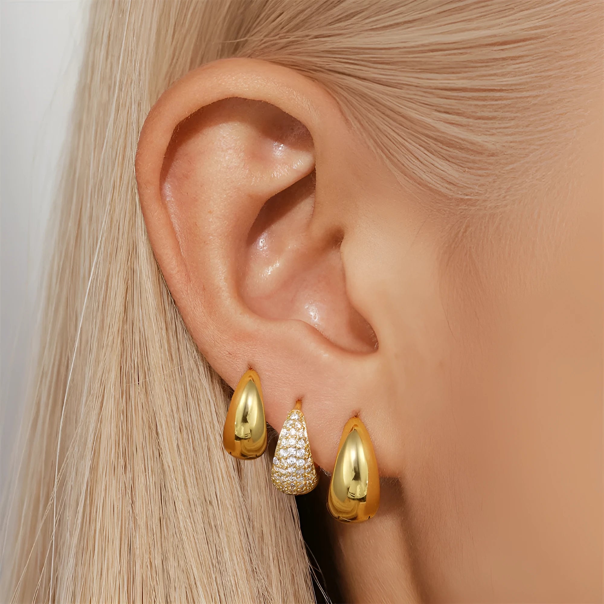 Brass diamond geometric earclip earrings with electroplated gold finish and round elements