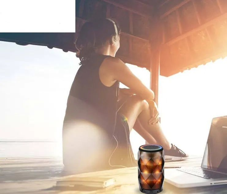 Black crystal diamond-cut Coca-Cola can shaped Bluetooth speaker lantern with colourful lights.