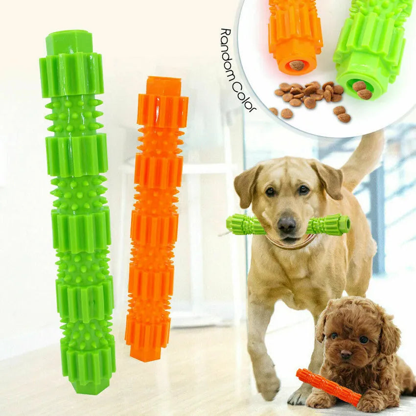 Green and orange bone-shaped rubber dog chew toy for aggressive chewers with treat hole and textured surface.