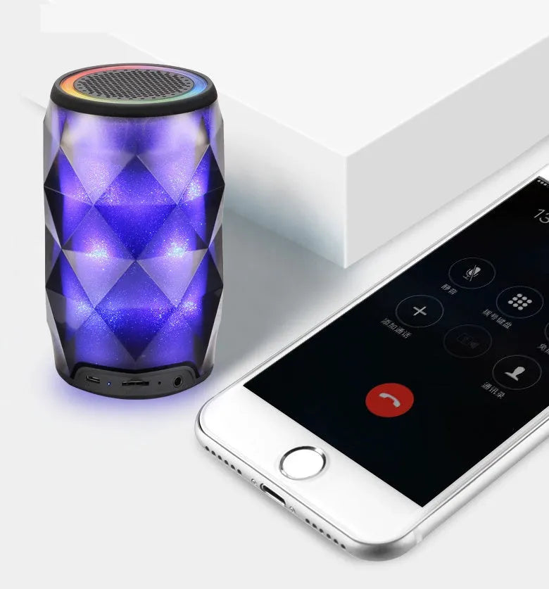 Black crystal diamond-cut Coca-Cola can shaped Bluetooth speaker lantern with colourful lights.