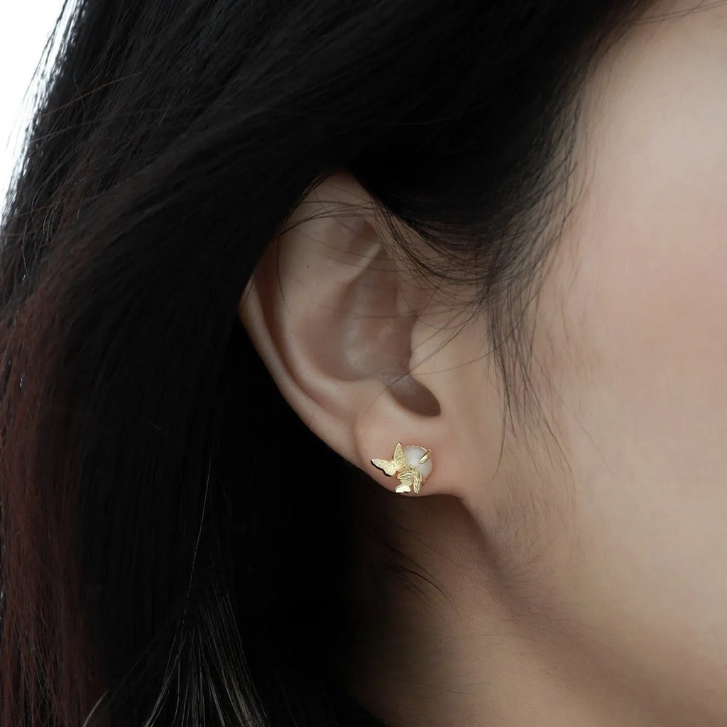 925 silver butterfly ear studs for women in white gold or gold colour finish.