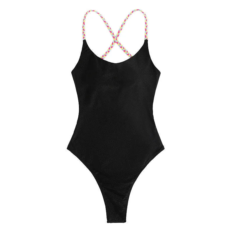 Black solid colour one-piece swimsuit for women with a backless design and sleeveless cut.