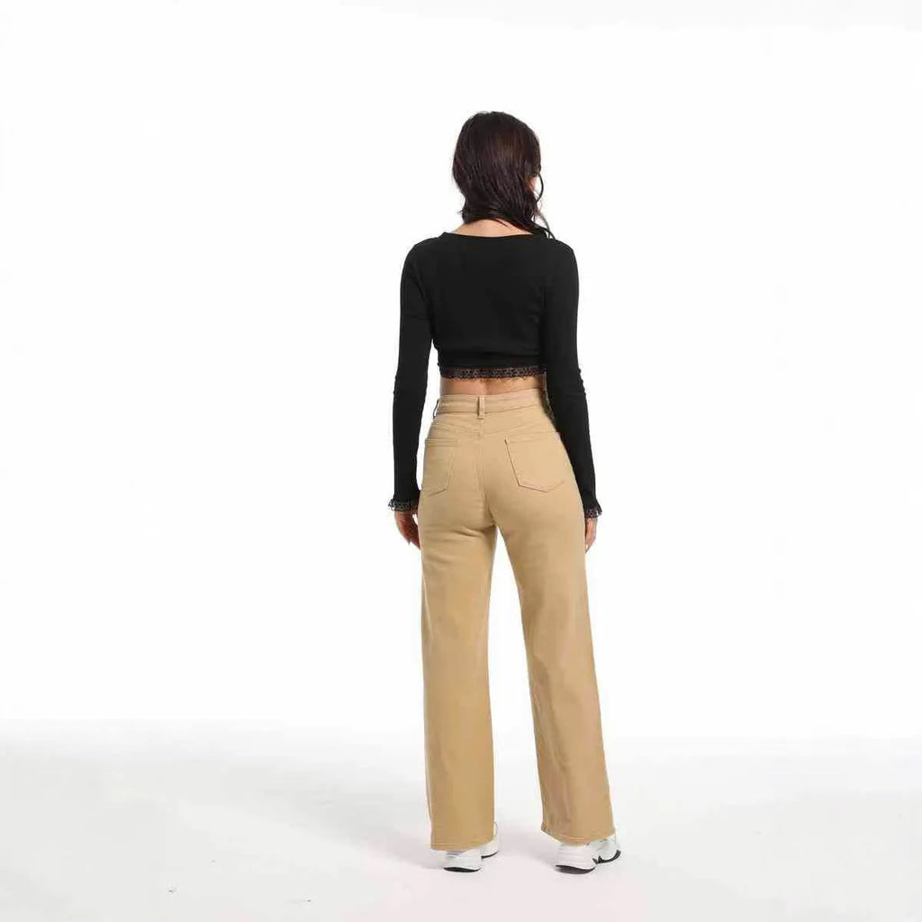 Women's high-waist wide-leg jeans in apricot and khaki colours, showing the relaxed fit and trouser length.