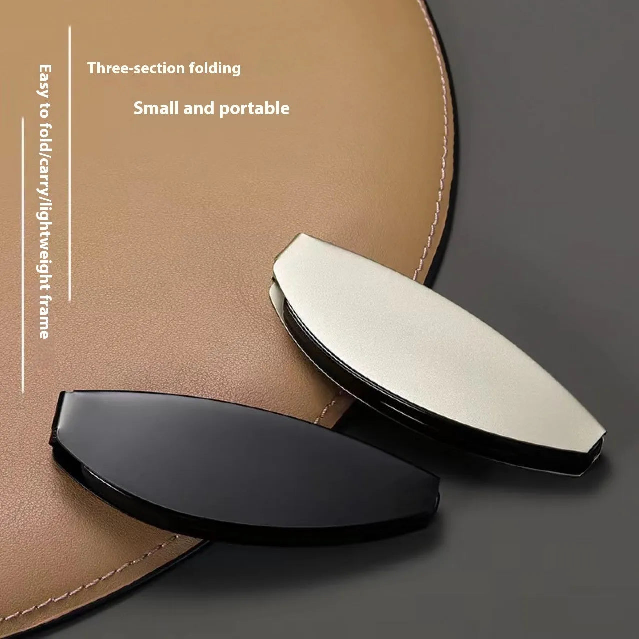 Folding presbyopic glasses in black retro frame showing ring detail and folded position