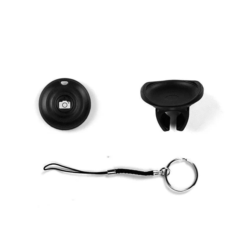 Black Bluetooth selfie remote control made of PC material weighing 27g