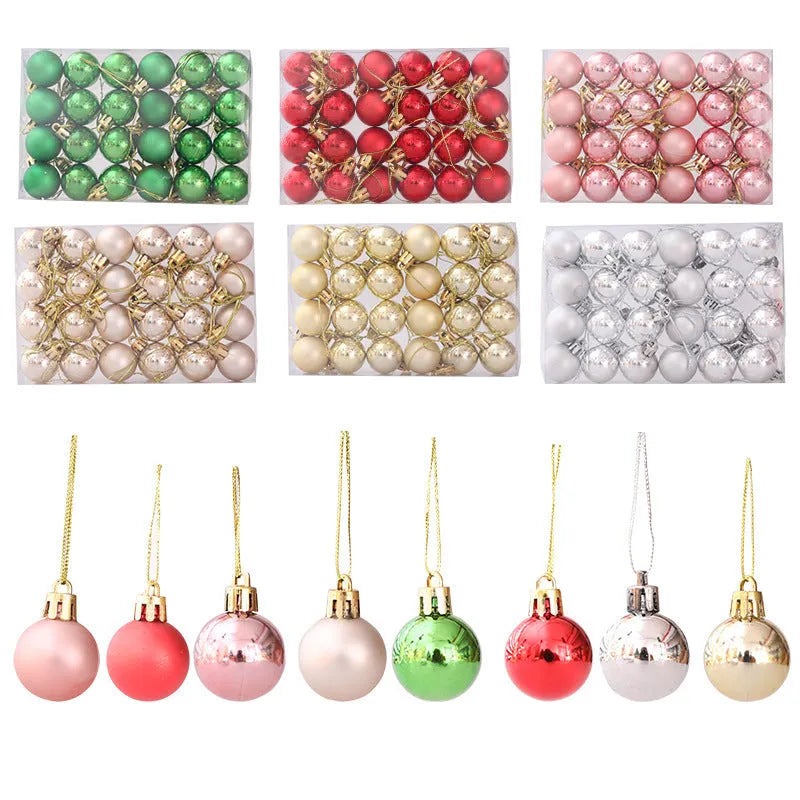 Boxed set of 24 plastic Christmas tree decorations in gold, silver, red, green, champagne gold, and rose gold.