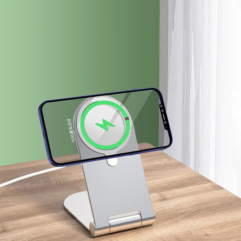 Silver vertical adjustable magnetic phone bracket for iPhone 12 on white background