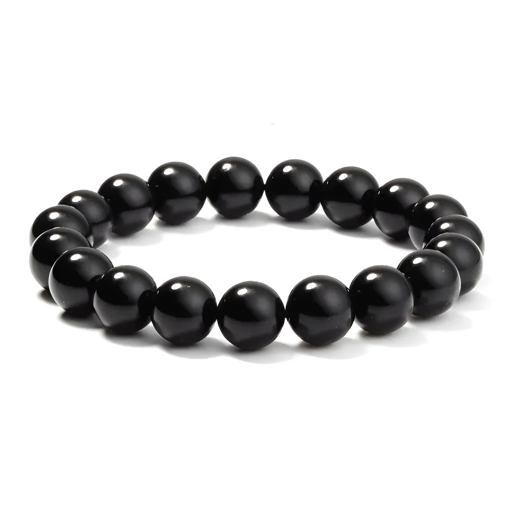 Geometric black onyx bead bracelet for women with elastic cord.