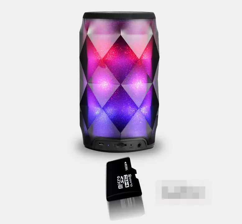 Black crystal diamond-cut Coca-Cola can shaped Bluetooth speaker lantern with colourful lights.