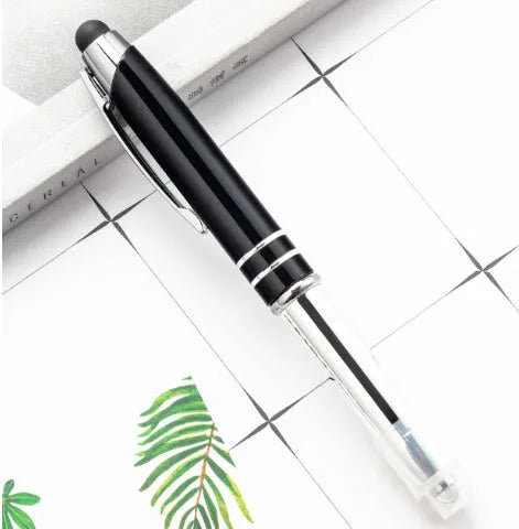 Red metal multifunctional stylus ballpoint pen with LED light and capacitive tip.