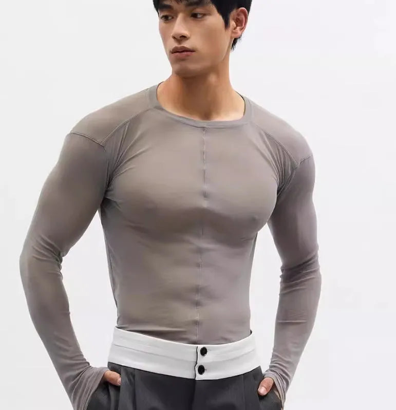 Black slim-fit long sleeve pullover made from ultra-thin see-through PU mesh fabric on a hanger.