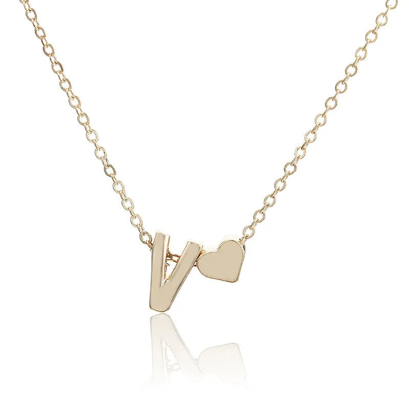 Peach heart shaped letter necklace pendant in gold or silver alloy, 5.5g, A to Z initial design