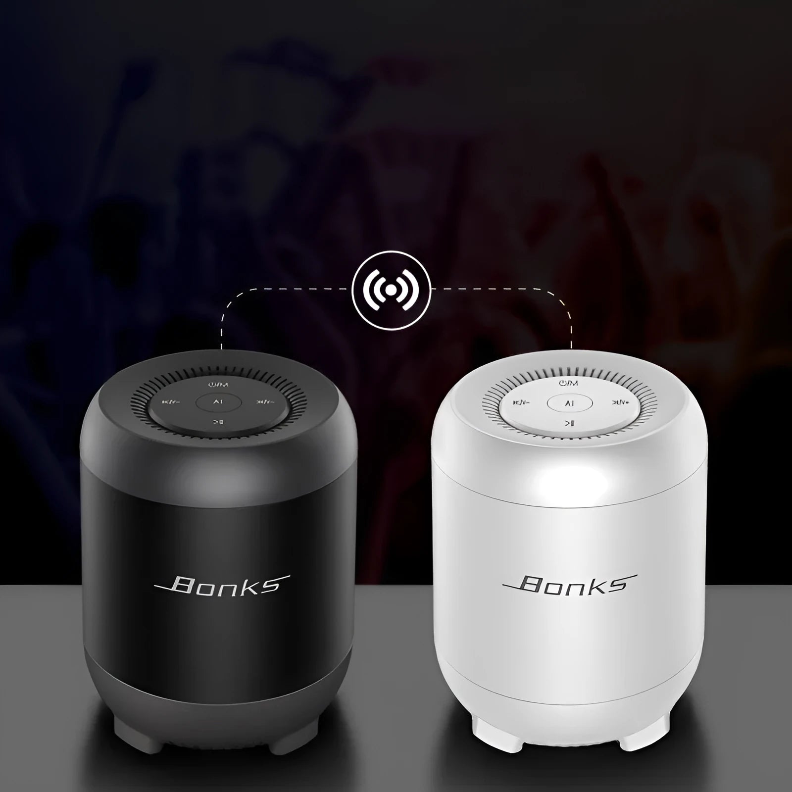 Black and white Bluetooth speaker with AI voice control features and circular plastic housing