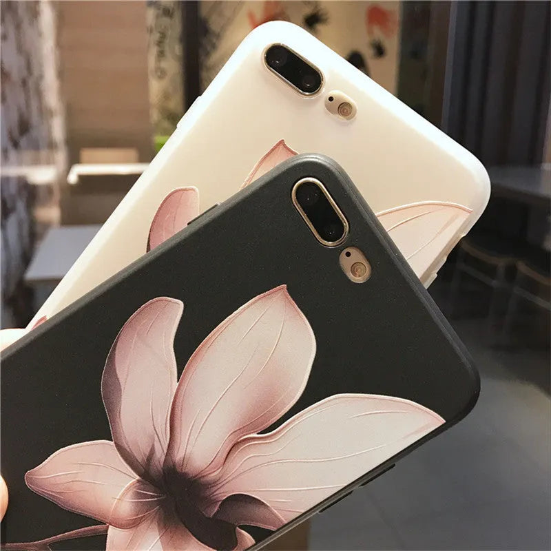 Embossed floral iPhone case in TPU material showing black and white colour options
