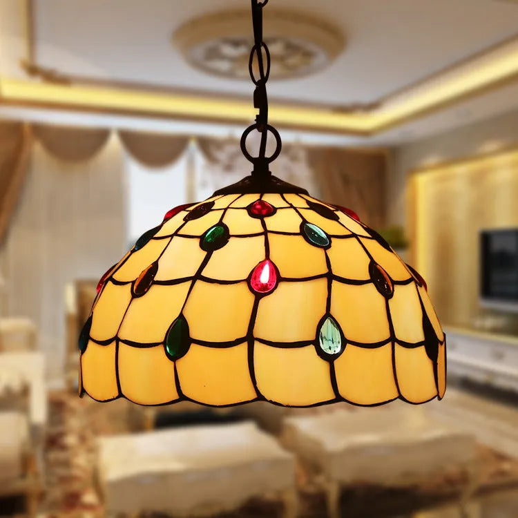 European retro Baroque style chandelier with coloured glaze finish and abstract design.