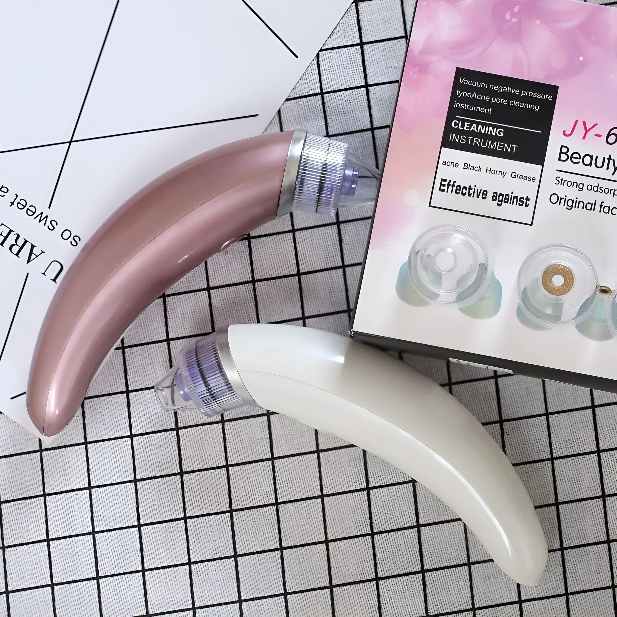 JY-666 electric blackhead suction instrument in rose gold or white colour for facial pore cleansing