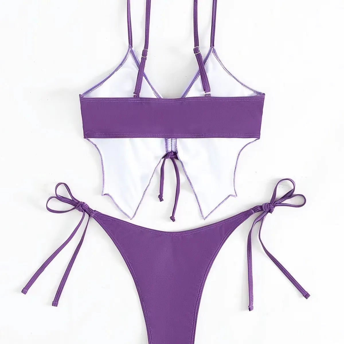 Women's purple bikini suit with bow detail and high-waisted briefs for swimming.