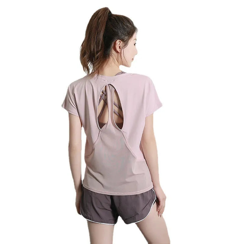 Women's polyester sports T-shirt short sleeve in pink colour for running fitness activities