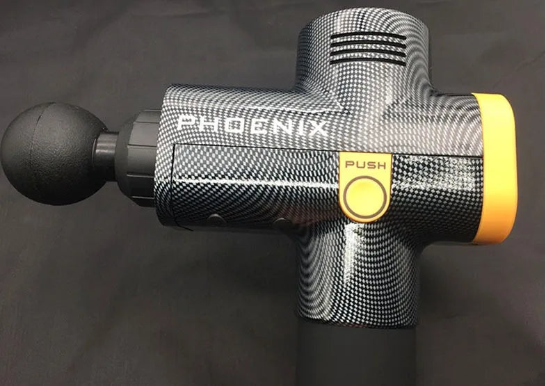 Black fascia massage gun with four removable heads on a grey background