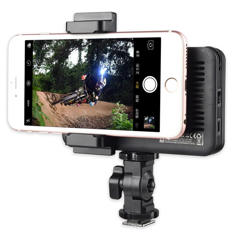 Shenniu M150 ultra-thin silver LED video light mounted on a smartphone showing its slim profile