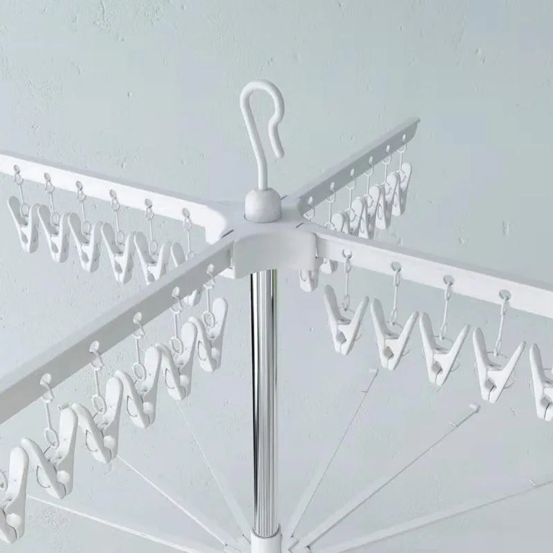 Three-layer stainless steel mobile drying rack with plastic clips and modern simple design