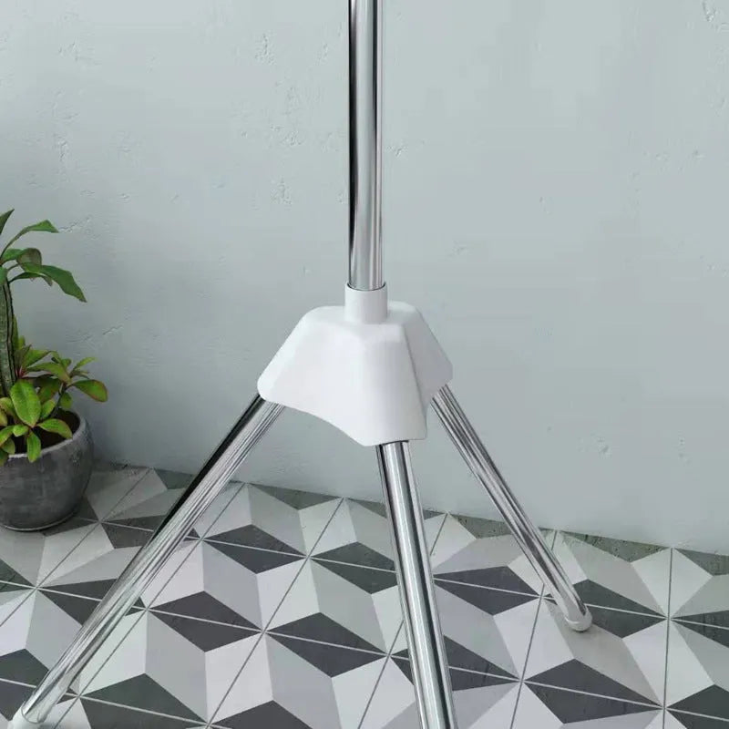 Three-layer stainless steel mobile drying rack with plastic clips and modern simple design