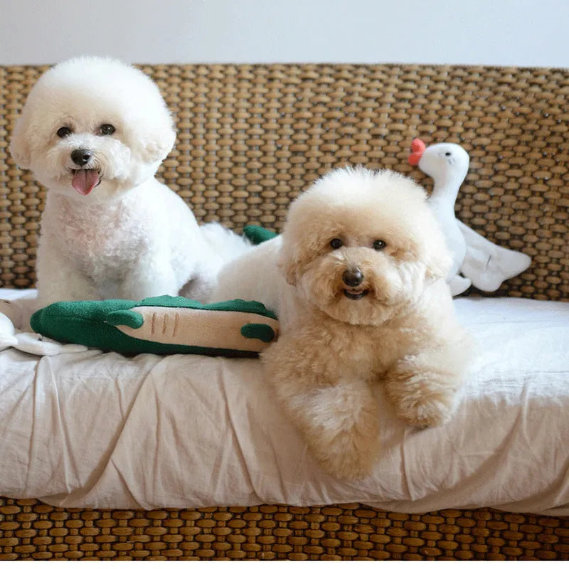 Green cotton plush dog toy measuring 35cm long by 18cm wide