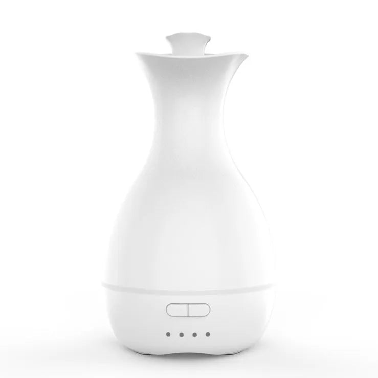 White or pink ultrasonic aromatherapy vase humidifier with colourful night light and essential oil diffuser