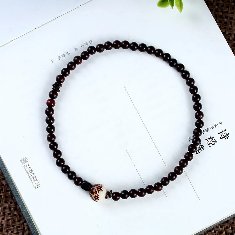 Natural rosewood double-ring bracelet with knitting construction and flower pattern elements