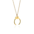 Close-up of a geometric copper pendant necklace with a gold electroplated finish on an adjustable cross chain.