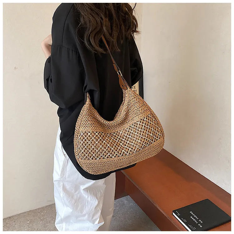 Women's straw cross body bag with soft construction and sandwich pocket in khaki colour