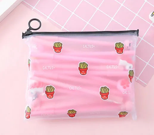 20 cartoon cactus design black gel pens inside a white plastic storage case.