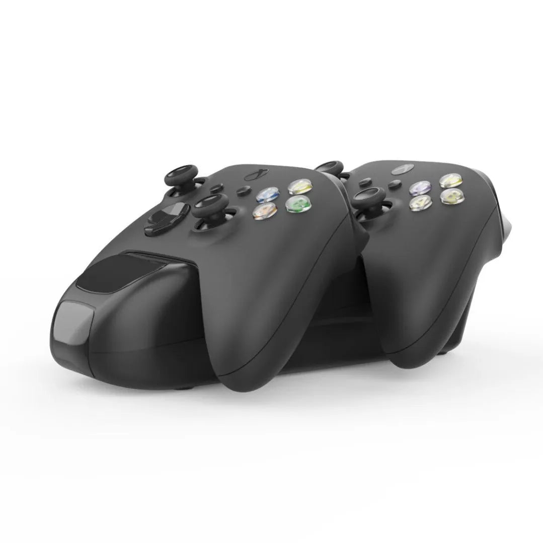 Black Xbox Series X/S wireless controller charging dock showing two controllers charging with LED status lights.