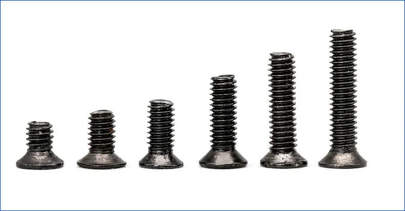 Black laptop repair screw set with countersunk head machine screws on a white background.