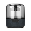 Black Four-Colour Light Touch Wireless Bluetooth Speaker with illuminated controls on a dark surface.