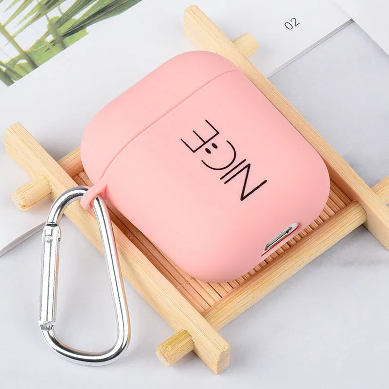 Black and Pink Apple AirPods silicone covers with Flower, Smiley, and Love designs.